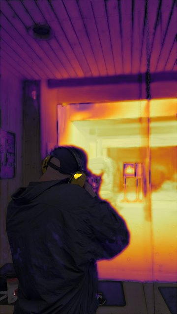 Per-pixel flicker map of the original: the lane glows yellow at 60 to 88 percent, the shooter is dark near 0 percent.